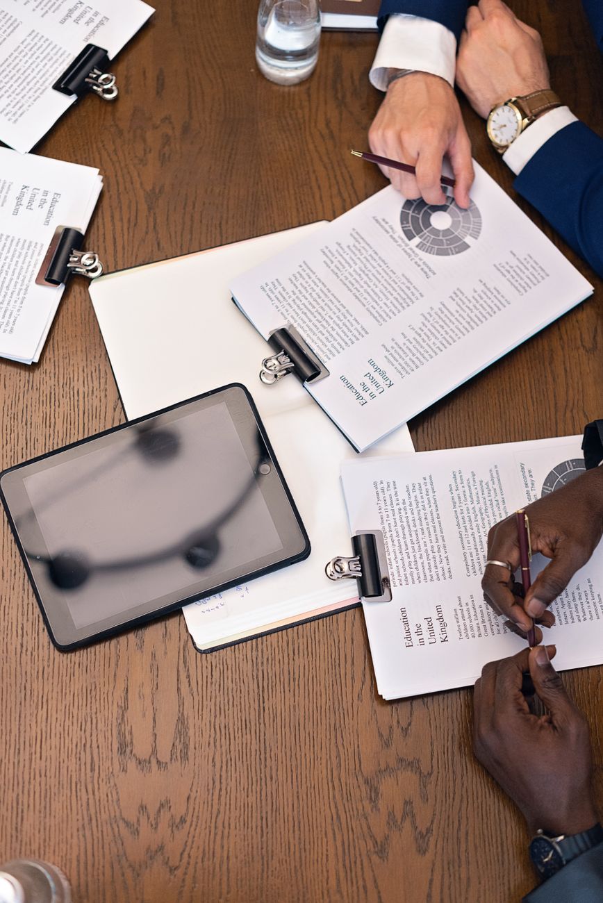 Business people analyzing digital transition charts
